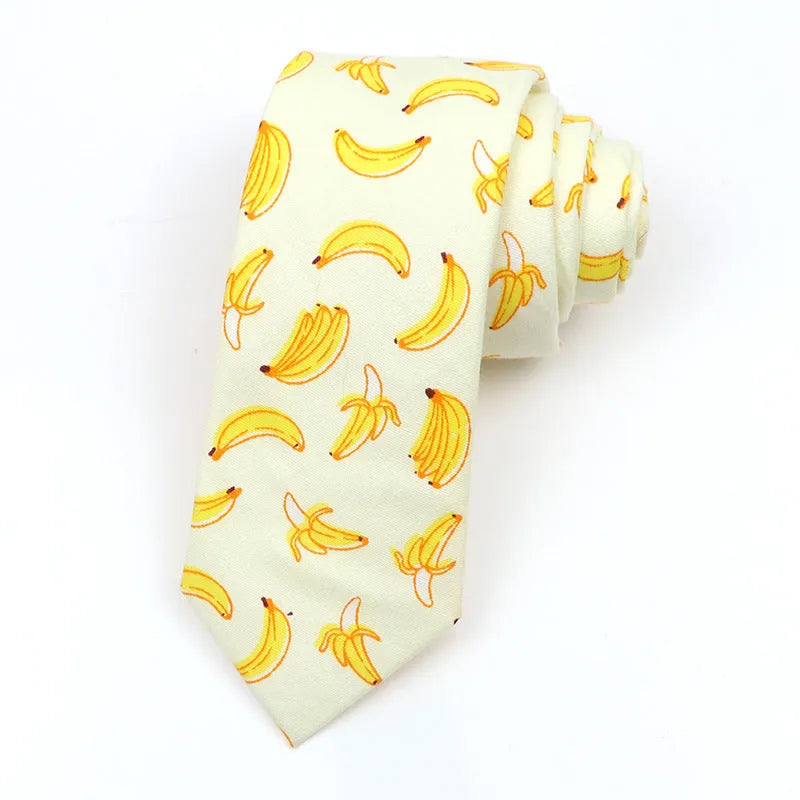 Narrow cotton bow tie with a printed cartoon pattern in a selection of colours.