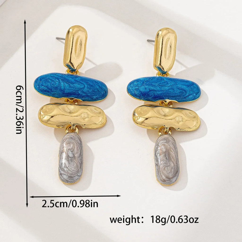 A pair of simple geometric stud earrings with a multicolour electroplated finish.