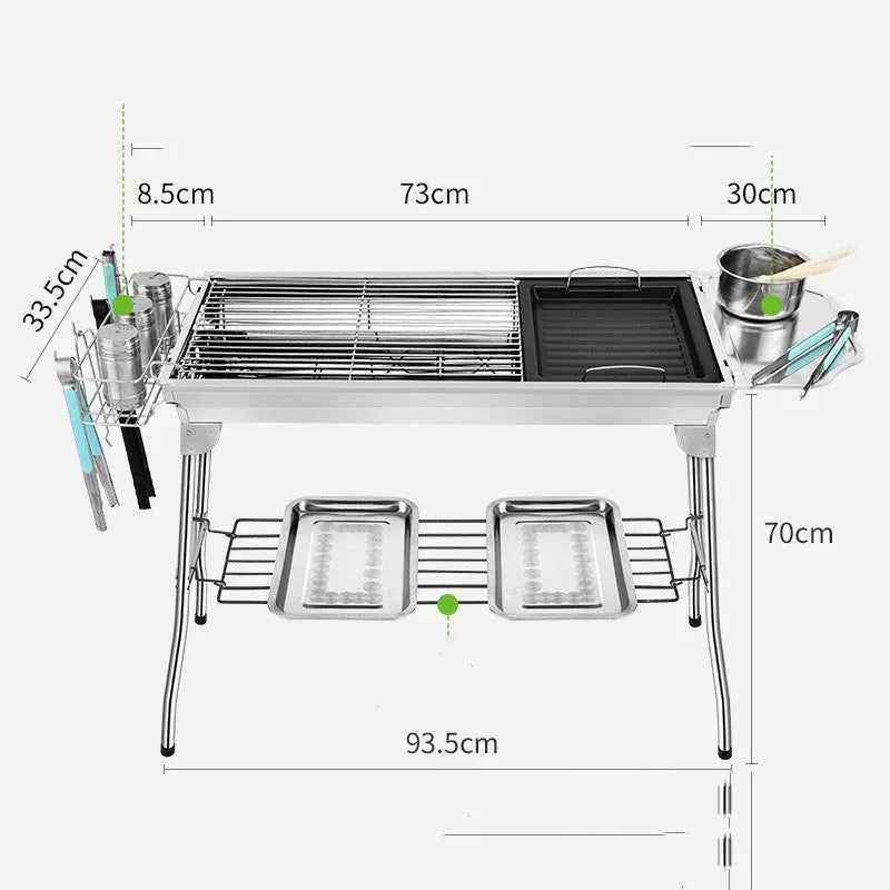 Stainless steel portable folding barbecue oven with grills, shown outdoors.