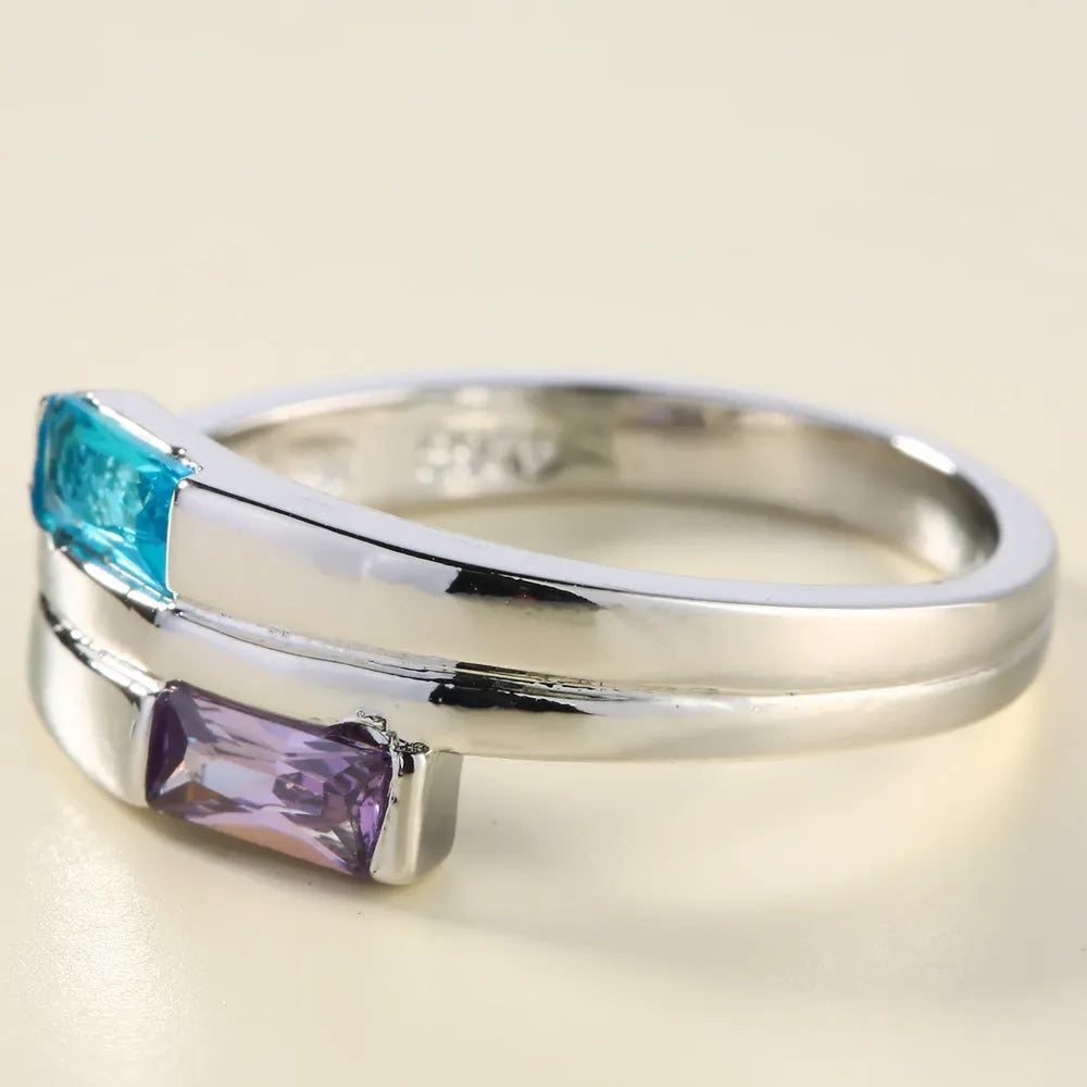 Copper ring with electroplated silver finish and inlaid zircon stones in contemporary European American style