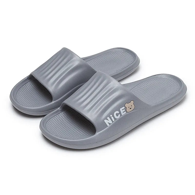 Cartoon pattern EVA flip flop slippers available in six colours for adult bathroom use