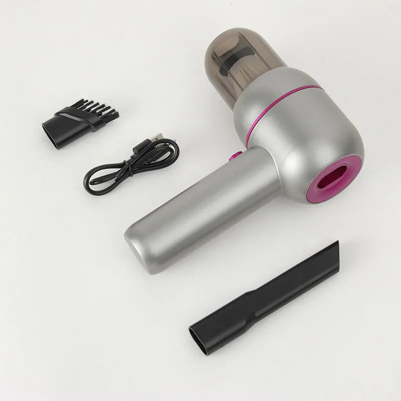 Grey XC-06 handheld portable car vacuum cleaner with brush nozzle and extended nozzle.