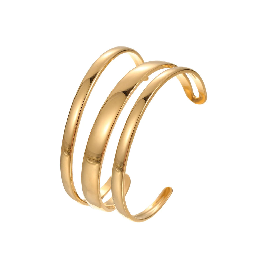 A geometric stainless steel bracelet with a simple opening clasp, shown in a gold electroplated finish.