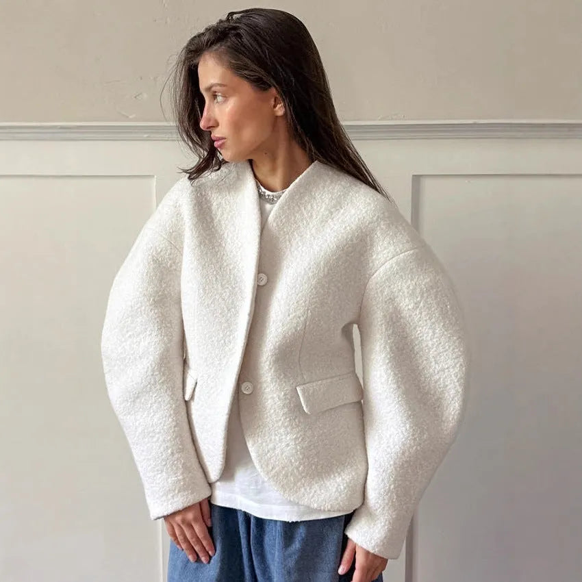 Women's coarse woolen thick polyester coat in solid white with raglan sleeves and stitching details