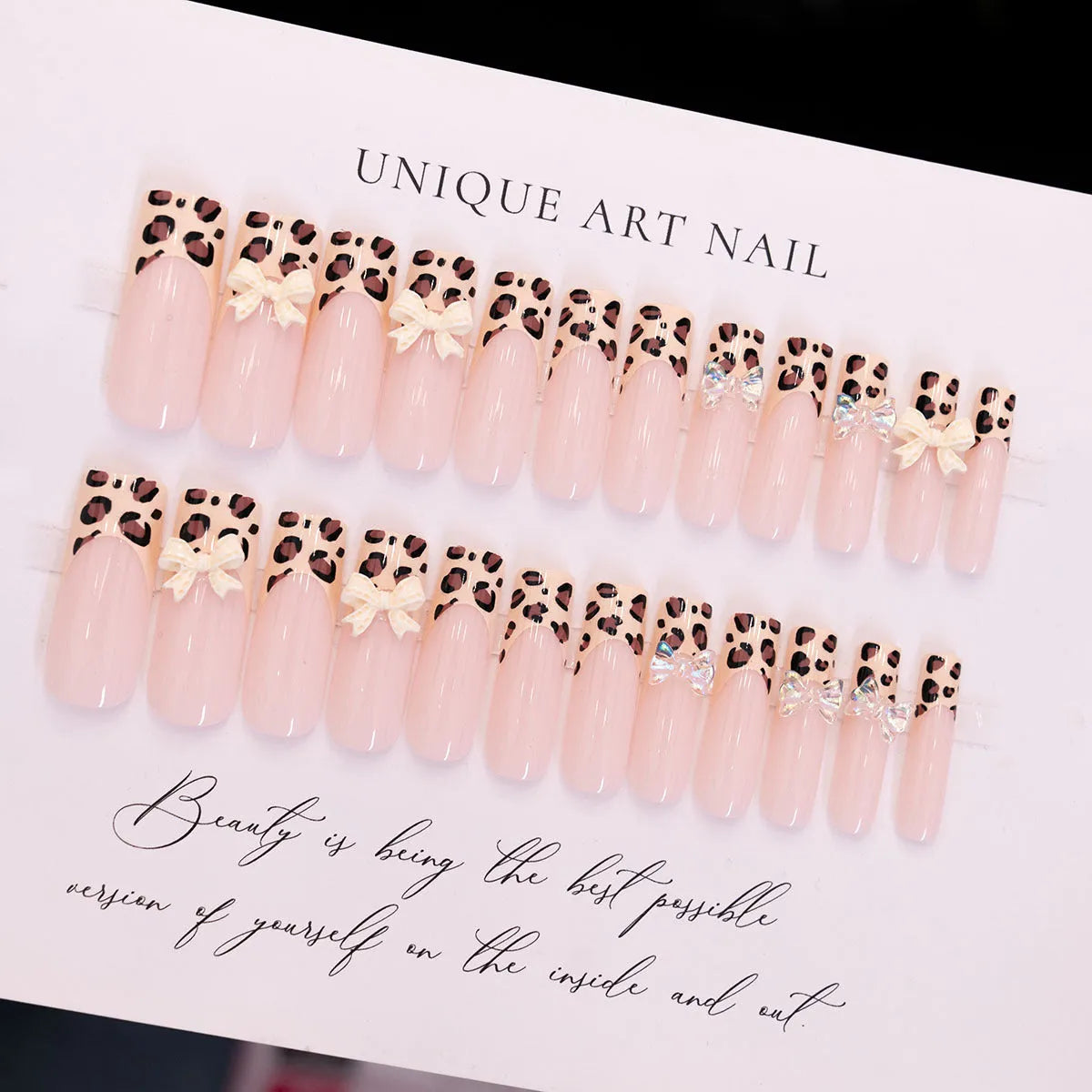 Leopard print butterfly shaped plastic nail art decorations in WM296 colour, pack of 60 pieces.