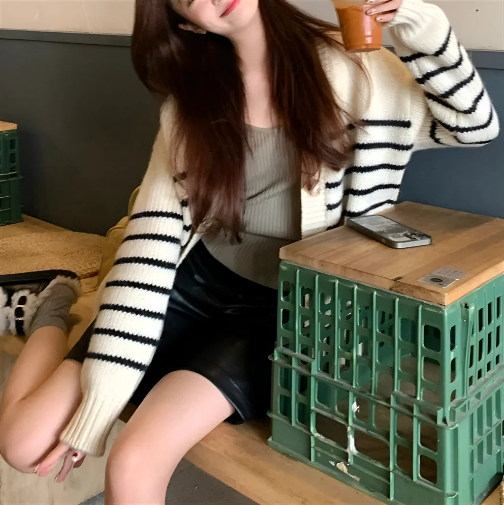 Collar button cardigan sweater with 3D pattern design in pictured colour
