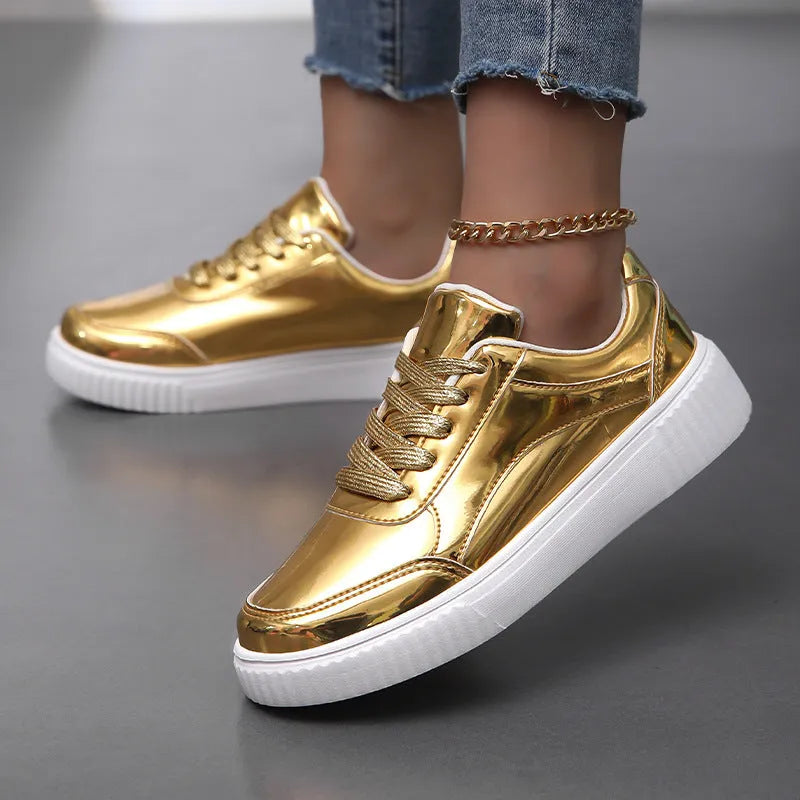 Thick-soled sequin sneakers in metallic rose gold with platform heel and round toe