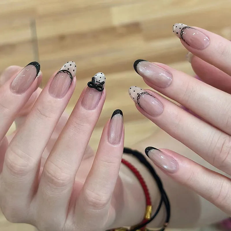 Set of sweet girl themed false nail tips with various designs for short to medium natural nails.
