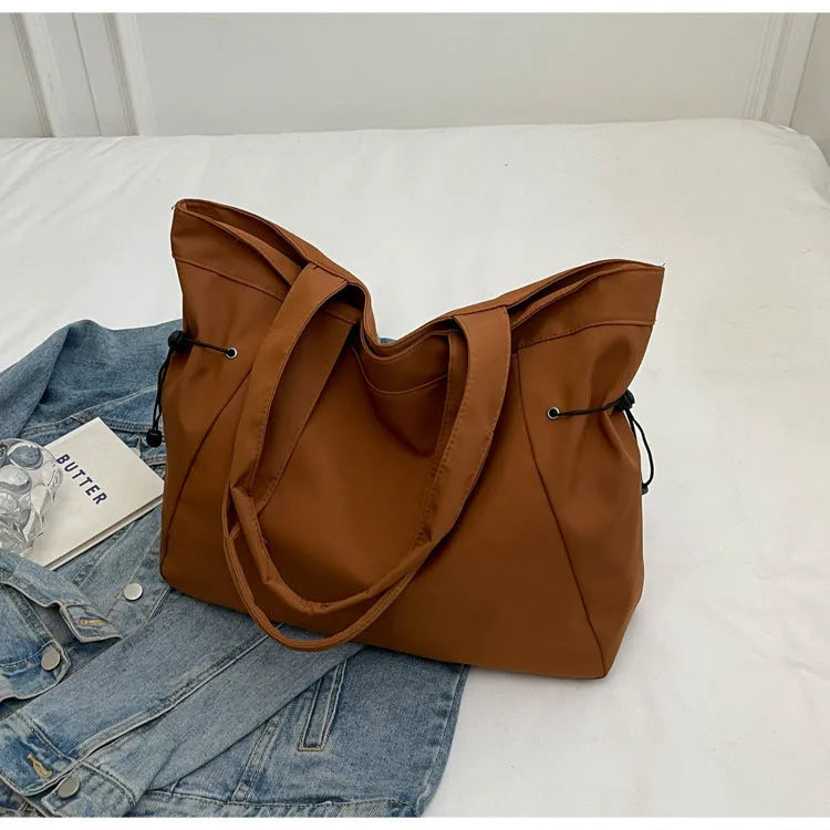Soft Oxford cloth folding shoulder tote bag in street trend style with shoulder strap