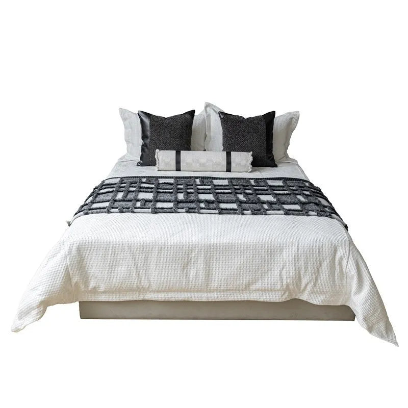Grey and white plaid polyester bed runner blanket set with pillow on a 1.5m bed