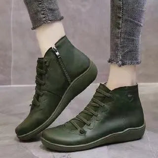 Women's casual ankle booties with a round toe, wedge heel, PU upper, and rubber sole in a selection of colours.