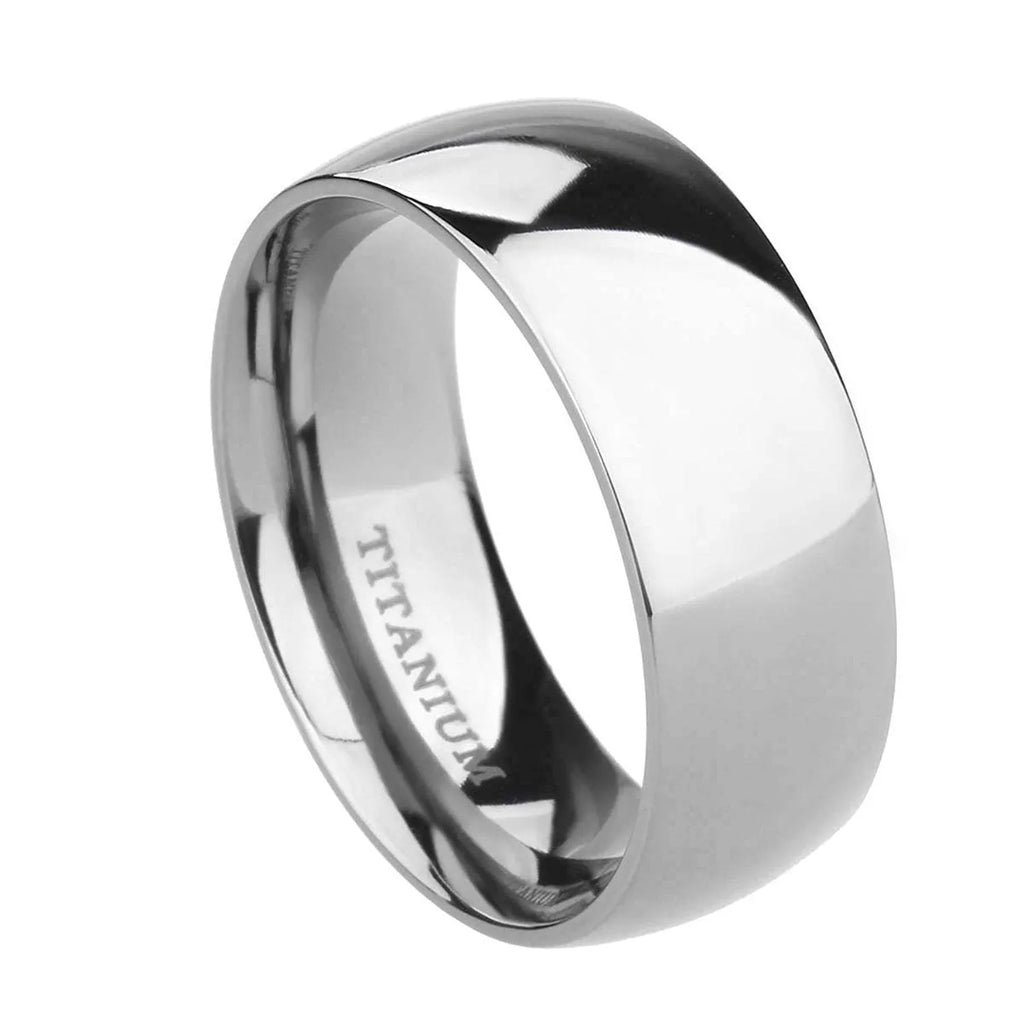 Silver titanium steel ring on a finger, showing a simple band design.