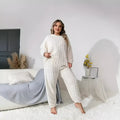 Women's milky white plush polyester two-piece pants set with crew neck top and matching trousers