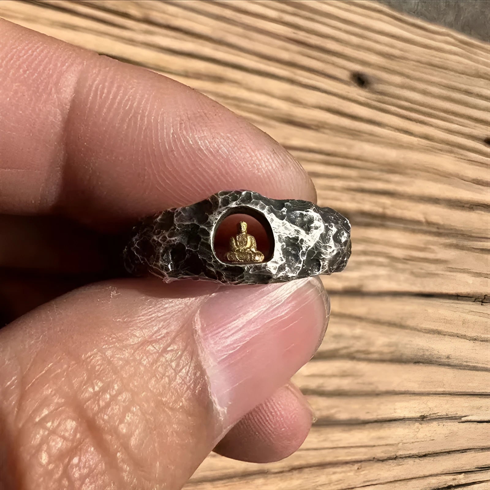 Hand-forged copper Grotto Buddha ring with rock texture, shown in size No. 8
