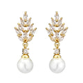 Geometric flower design earrings with micro inlaid zircon decoration in gold, platinum, and rose gold finishes
