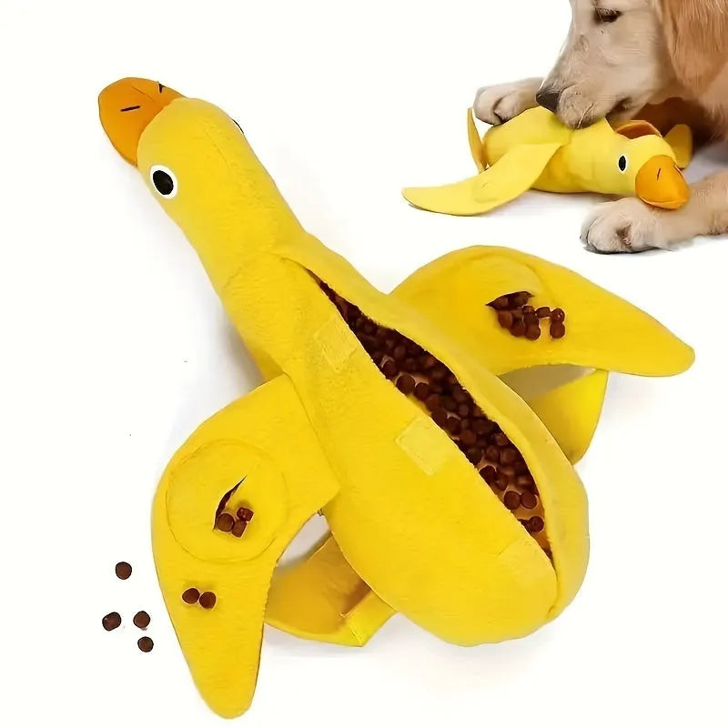 Yellow teddy bear duck plush dog toy with squeaker and treat holes.