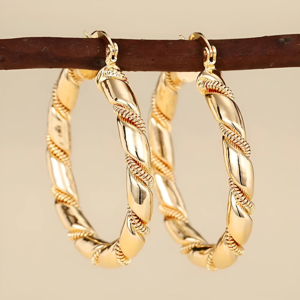 Geometric copper earrings for women in golden colour with ring and line design elements