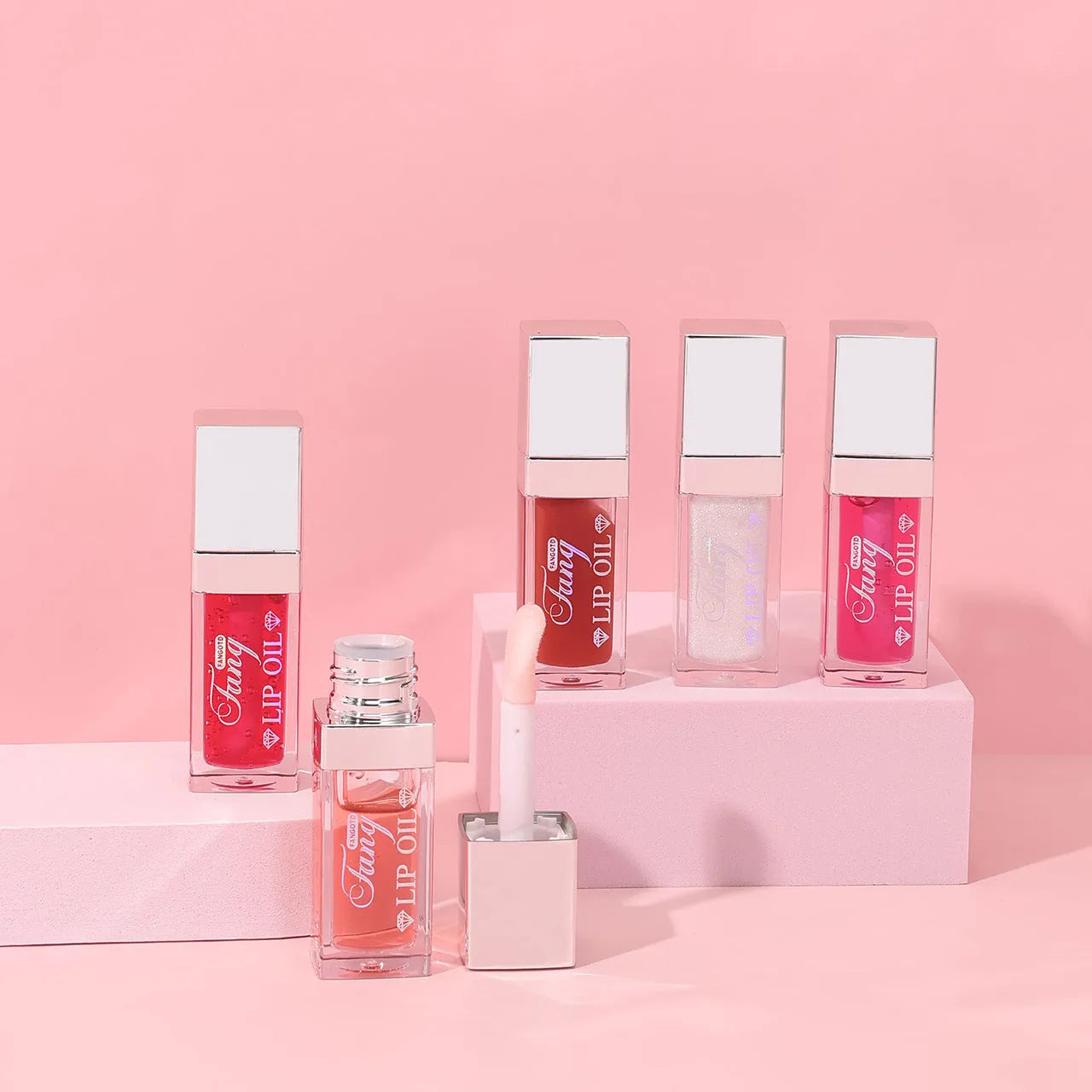 Set of five mint lipstick lip gloss tubes in shades 001, 006, 007, 012, and 015.