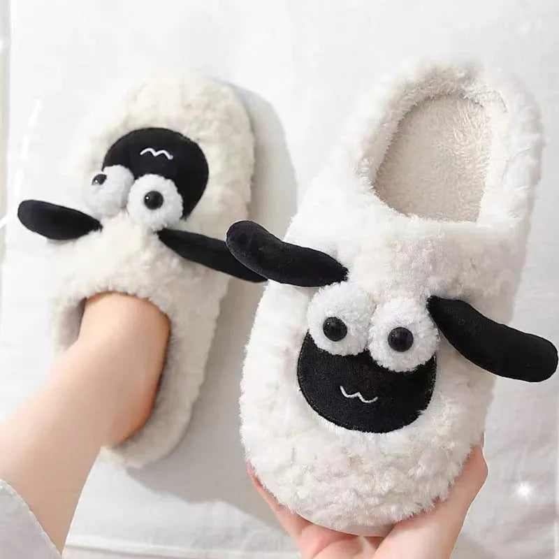 Brown, grey, and white suede and PVC slip-on slippers for indoor home use.