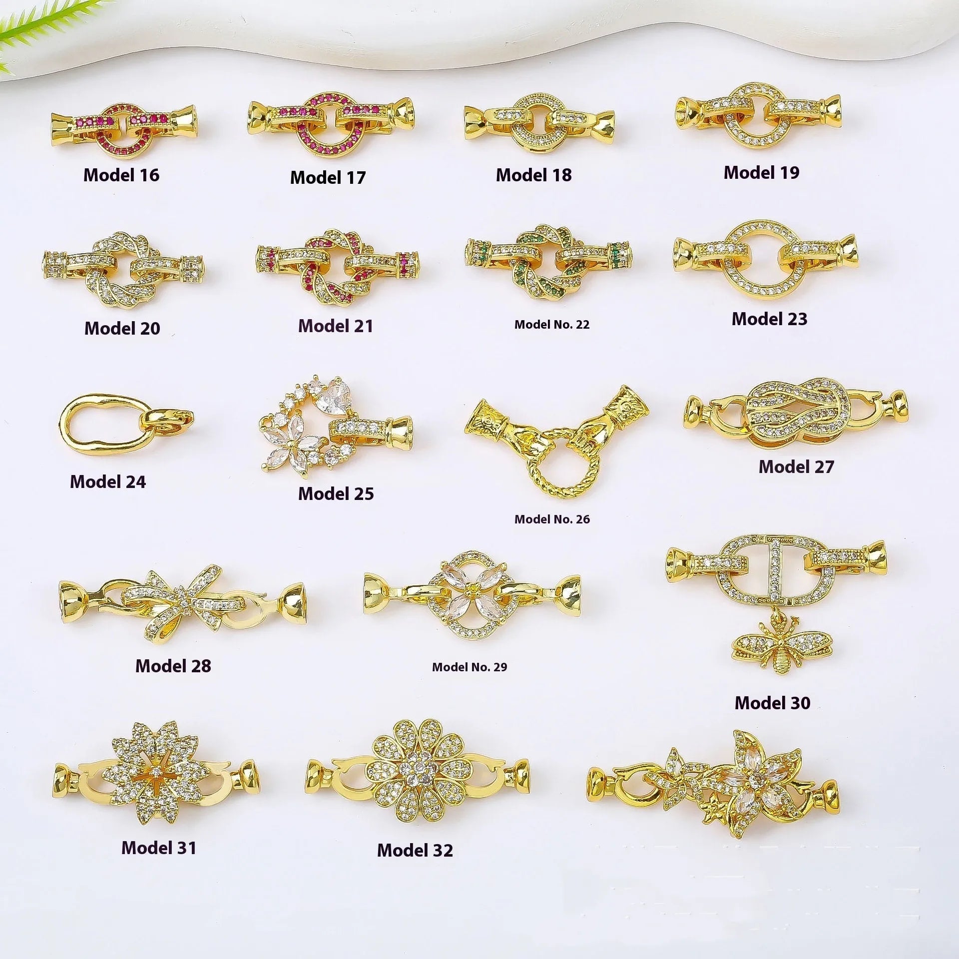 Small gold plated buckle clasp for DIY jewellery making on a white background.