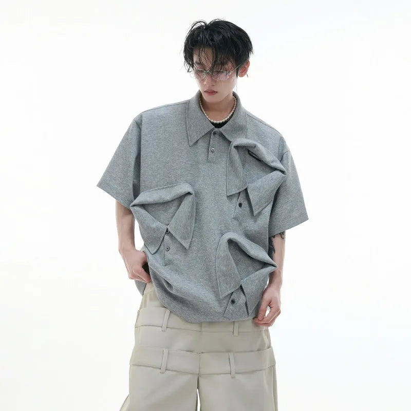 Men's loose fit deconstructed collar polo shirt with Giant Land Turtle geometric pattern in black.