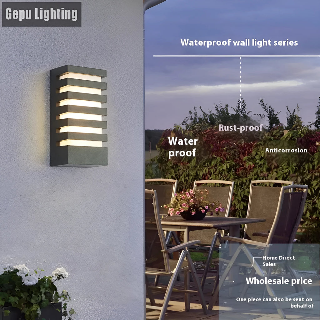 Modern minimalist aluminium outdoor wall lamp mounted on an exterior wall.