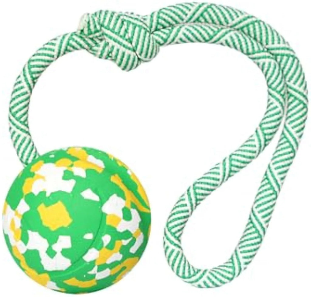 Natural rubber dog ball attached to a nylon rope for fetch and tug play.