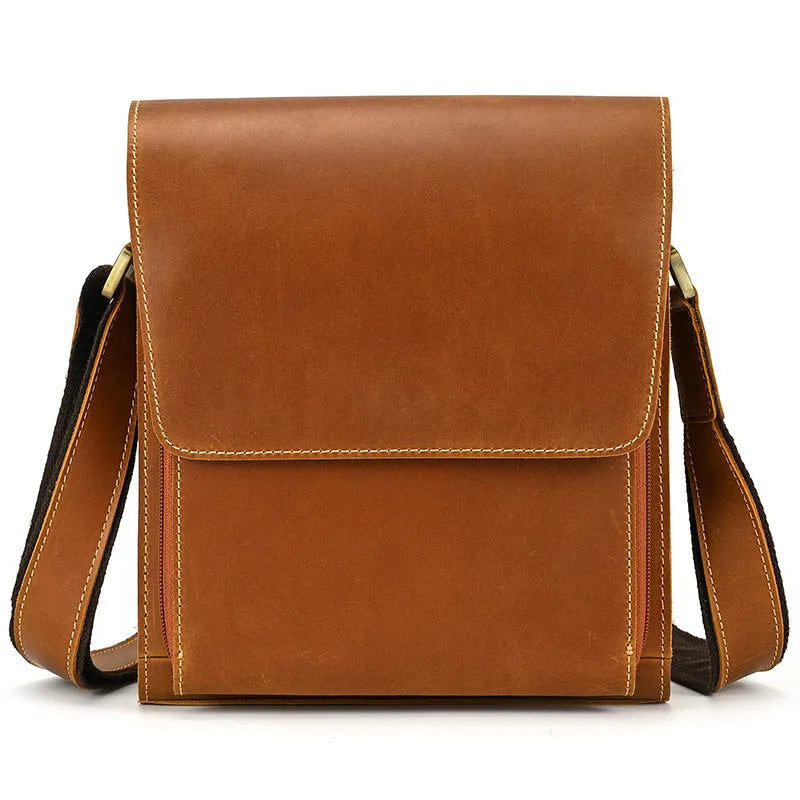 Men's dark brown Crazy Horse leather crossbody bag with visible stitching, shown holding A4 documents.