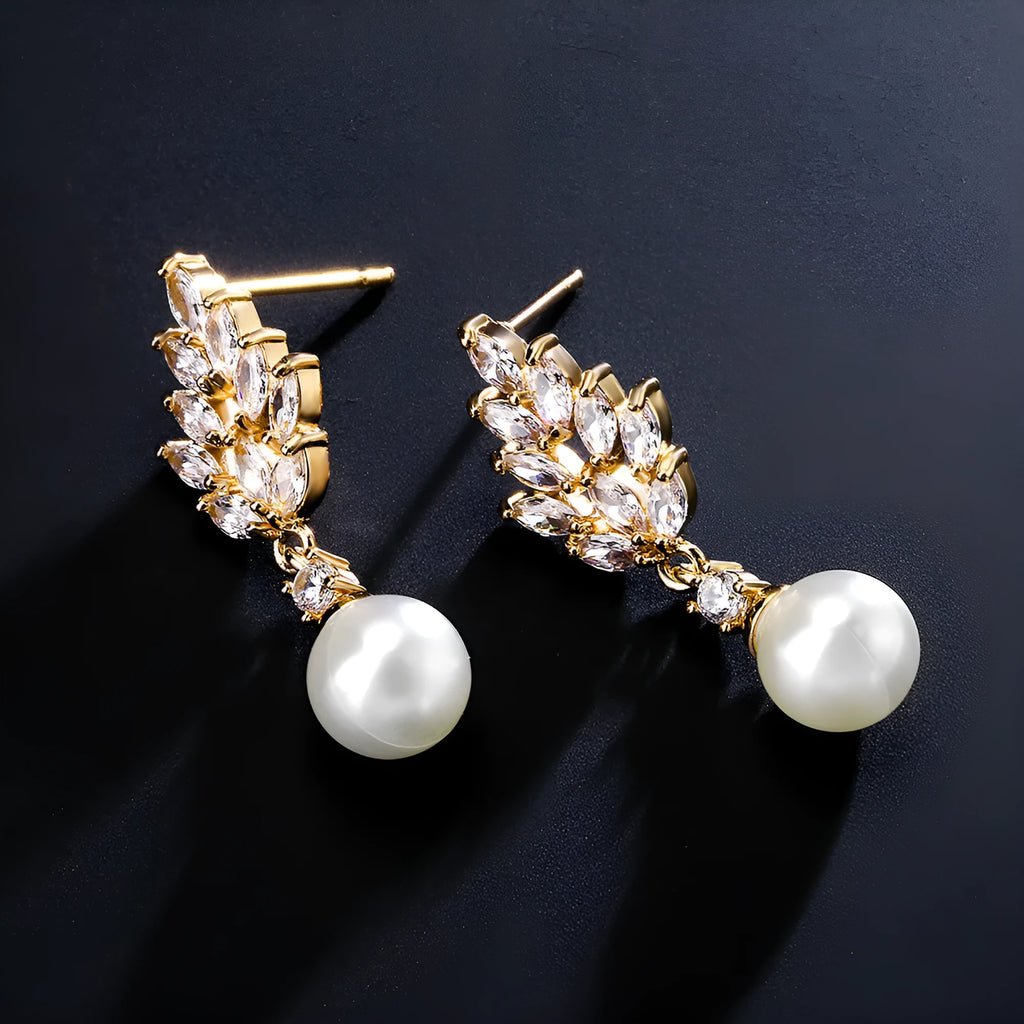 Geometric flower design earrings with micro inlaid zircon decoration in gold, platinum, and rose gold finishes