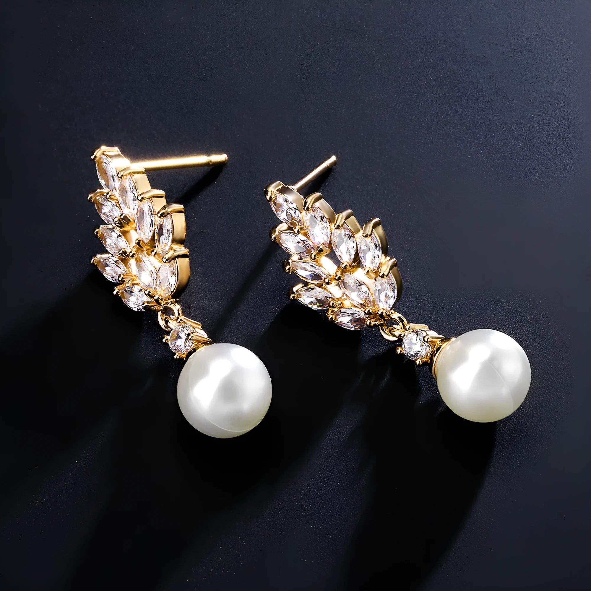 Geometric flower design earrings with micro inlaid zircon decoration in gold, platinum, and rose gold finishes