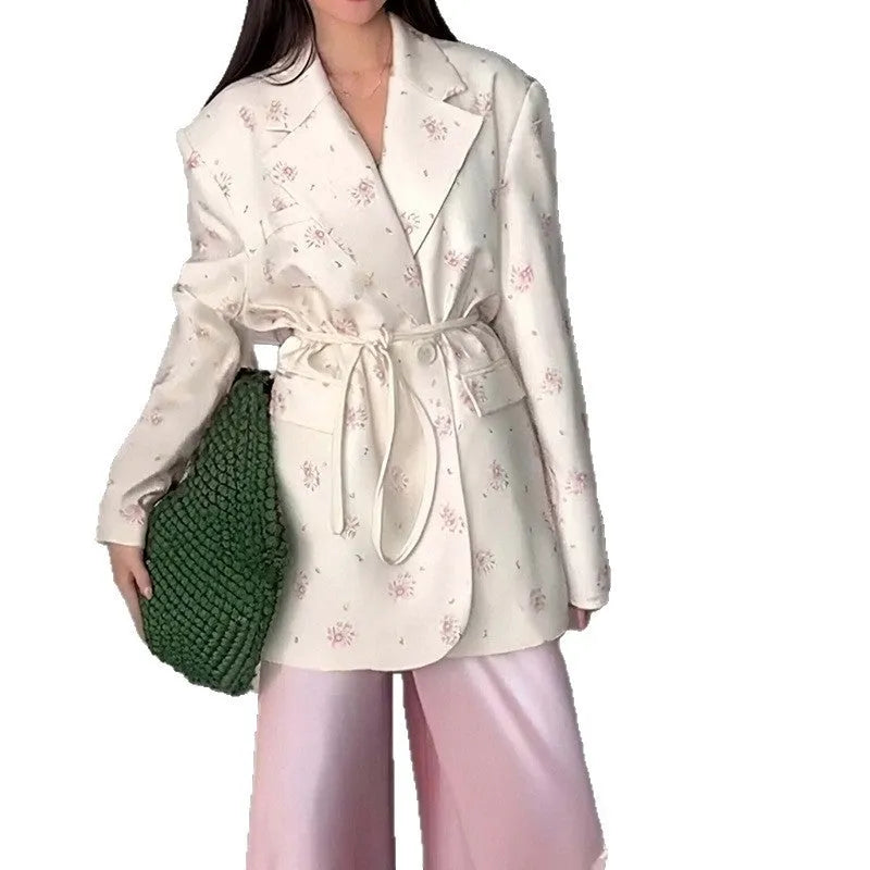 Womens lace-up collar suit jacket in a floral print with a cinched waist