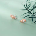 Copper willow leaf stud earrings with micro-inlaid leaf detailing, rose gold or white gold finish, side view on white background