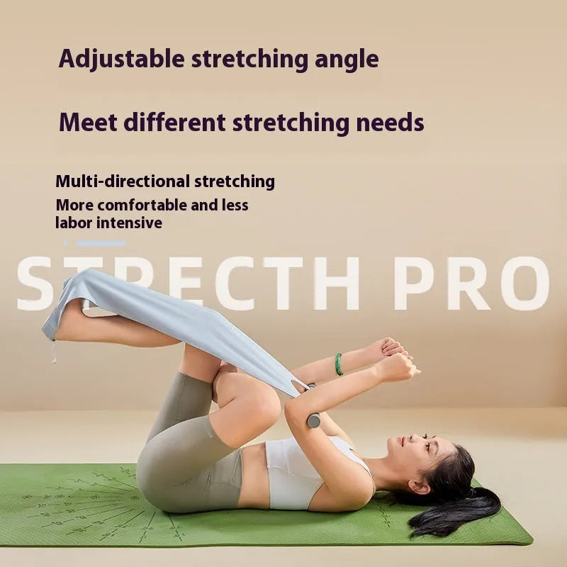 Grey and pink yoga stretching tool for shoulder and hip flexibility.