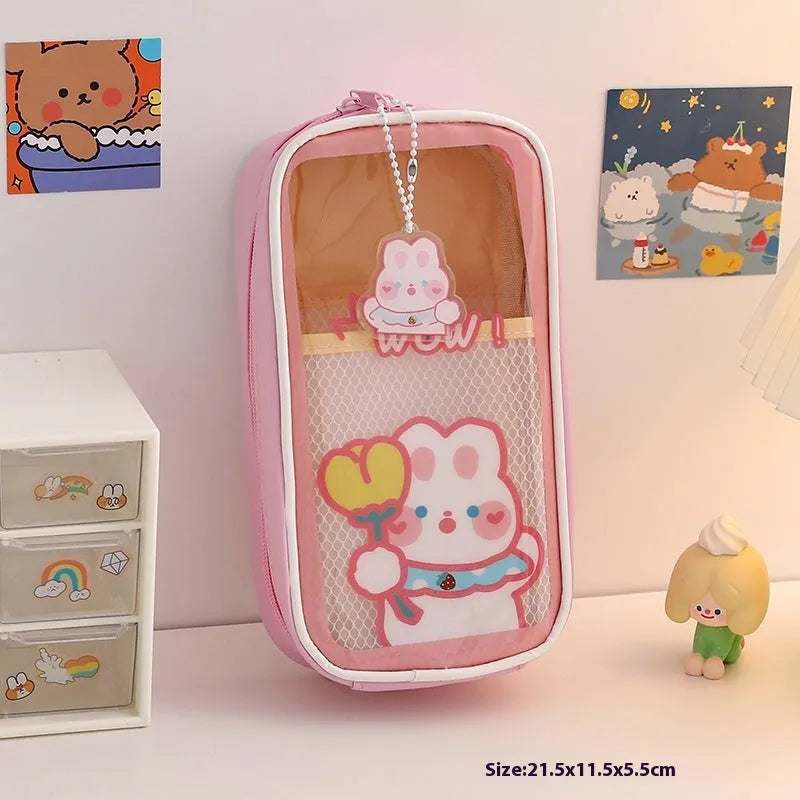 Transparent PVC student pencil case with cartoon design in candy bear, pink rabbit, blue dog, or purple dog colours