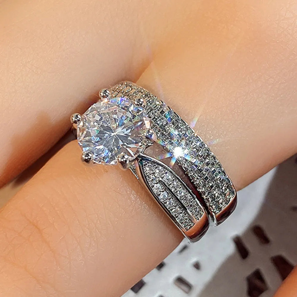 White gold geometric wedding ring bracelet with round elements on hand