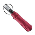 Triple folding black business umbrella with automatic opening mechanism and rubber handle