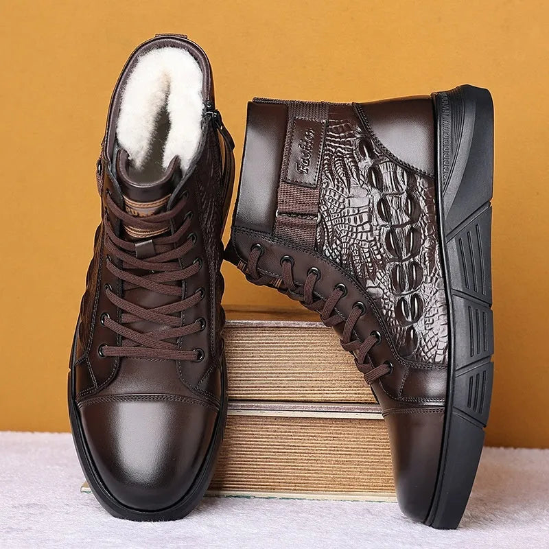 Brown genuine leather winter boots with fur trim and lace-up front, resting on a surface.