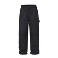 Black paratrooper trousers with elastic waistband and three-dimensional cutting in baggy fit style