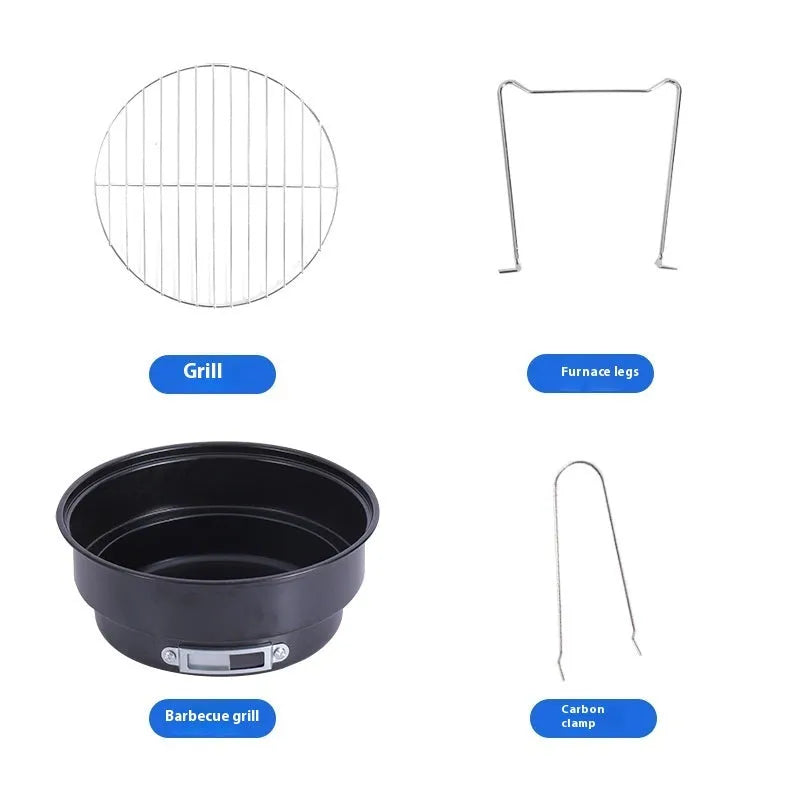 Small round metal camping stove with folding legs, mesh grill pan, charcoal clip, and carry bag.