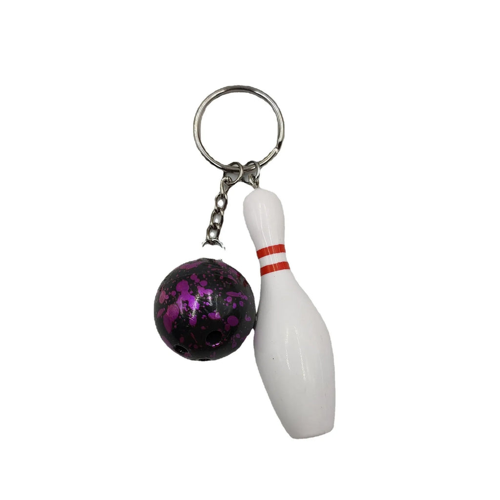 Mini bowling pin keychain pendant in four colour options with key ring attachment