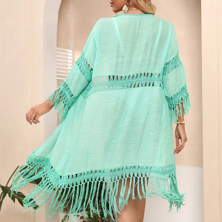 Women's yellow hand-crocheted acrylic beach cover-up cardigan with tassel trim, loose fit.
