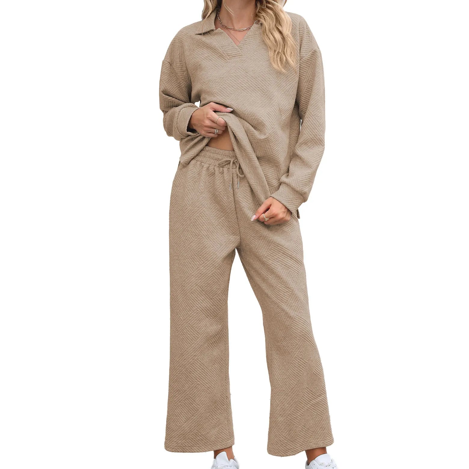 Women's solid colour rayon jacquard knit lapel sweater and elastic waist trouser set.