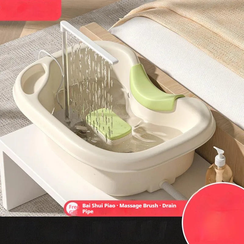 Light pink shampoo basin with circulating water pump and massage brush for bed hair washing