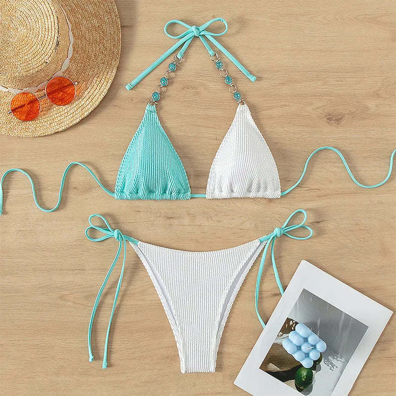 Women's colour matching swimsuit with lace-up design and pearl chain decoration