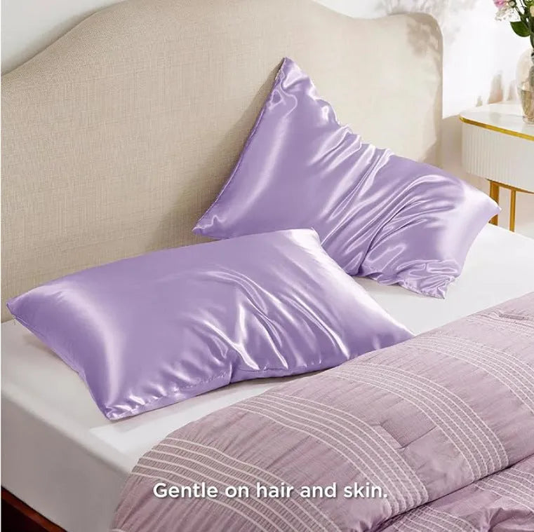 Pair of solid colour satin cloth pillowcases showing colour options including navy blue, wine red and light pink