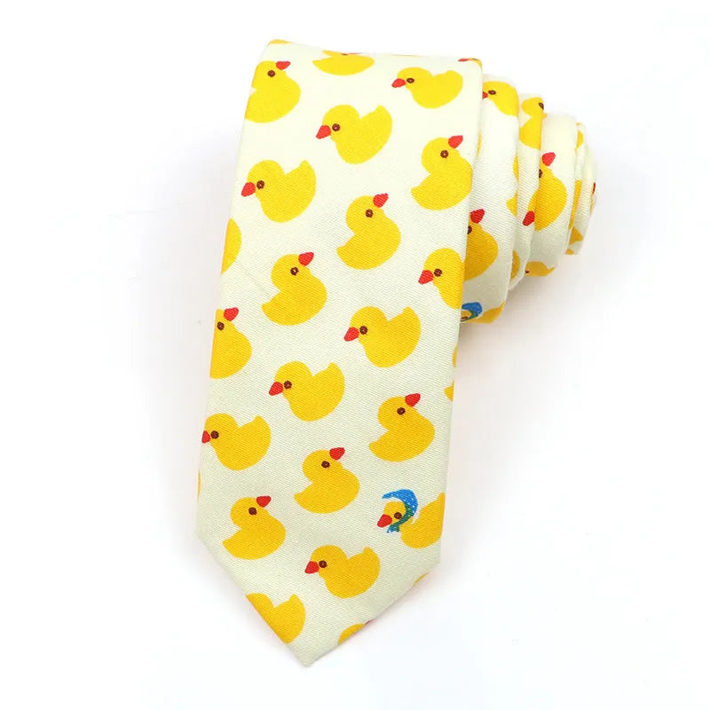 Narrow cotton bow tie with a printed cartoon pattern in a selection of colours.