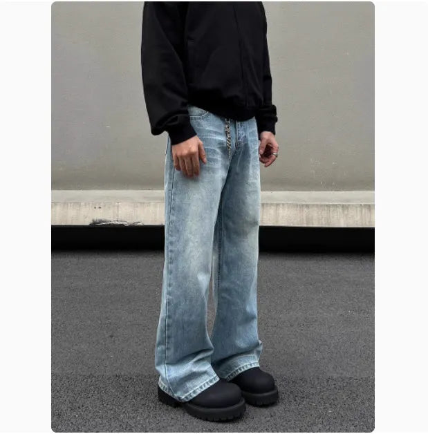 Men's blue straight leg jeans with whisker wash detail and wide leg flare
