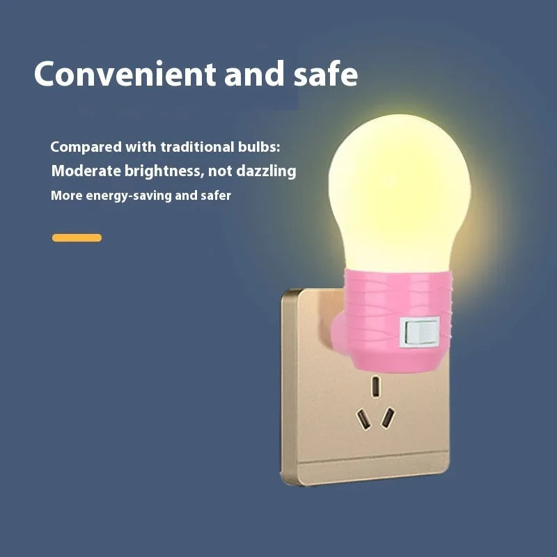 Compact round plug-in bedside lamp in white, blue, or pink for night feeding.