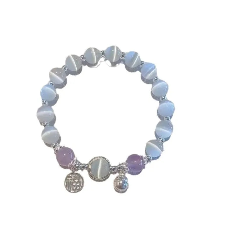 Women's glass butterfly bracelet with coloured glaze beads in drop shape design