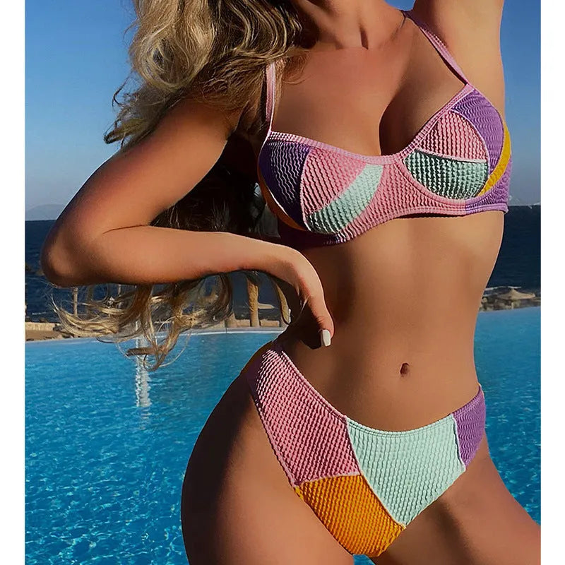 Ladies splicing colour bikini set with steel push-up cups and backpack stitching detail on the back.